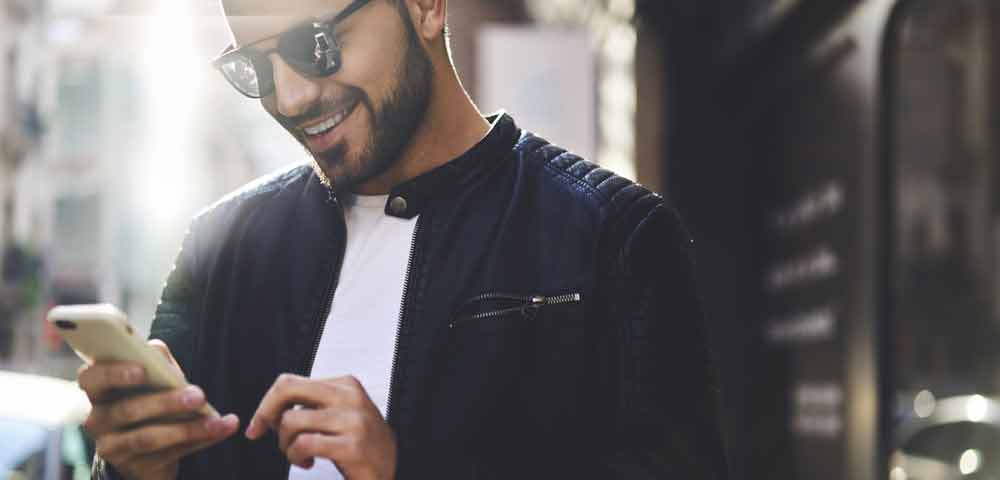 A young man with a smartphone