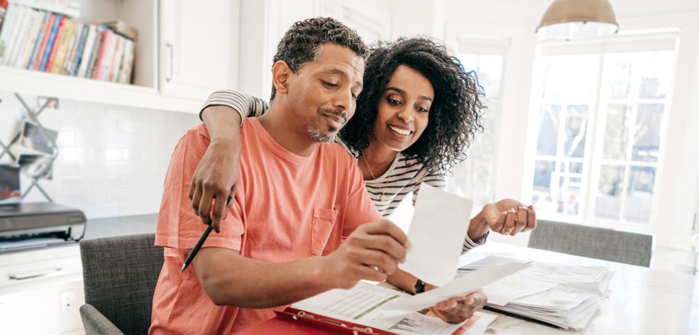 couple reviewing receipts